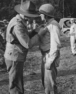 Lieutenant General Joseph Stilwell awarding the Silver Star medal to Lieutenant Albert J. Harvey, Hukawng Valley, northern Burma, 18 Mar 1944