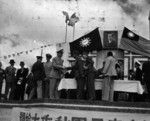 Major General D. L. Weart greeting General Tang Enbo during Double-Ten Day celebrations, Shanghai Race Course, Shanghai, China, 10 Oct 1945